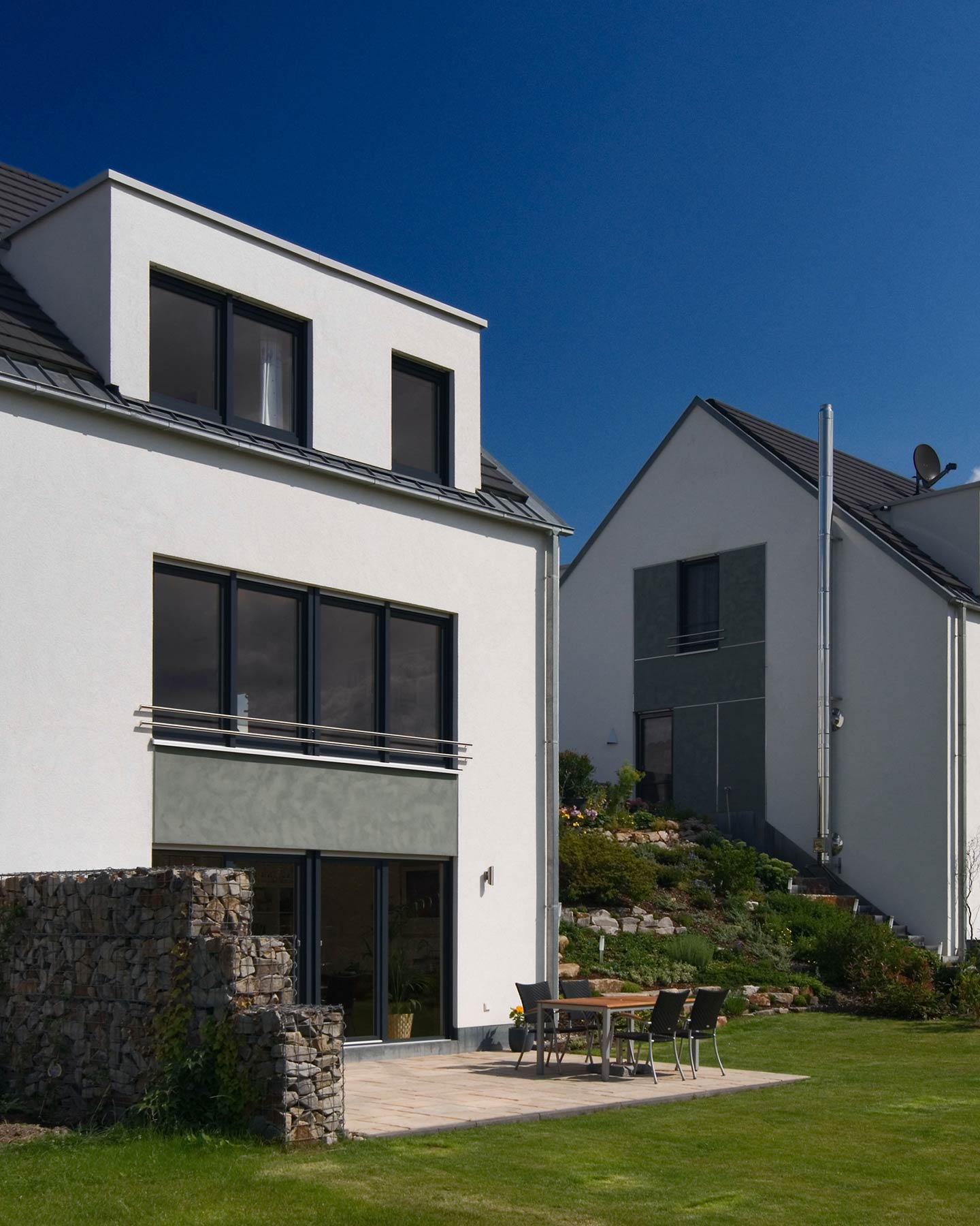 Wohnsiedlung 14 Einfamilienhäuser Witten Rückseite Terrasse Garten